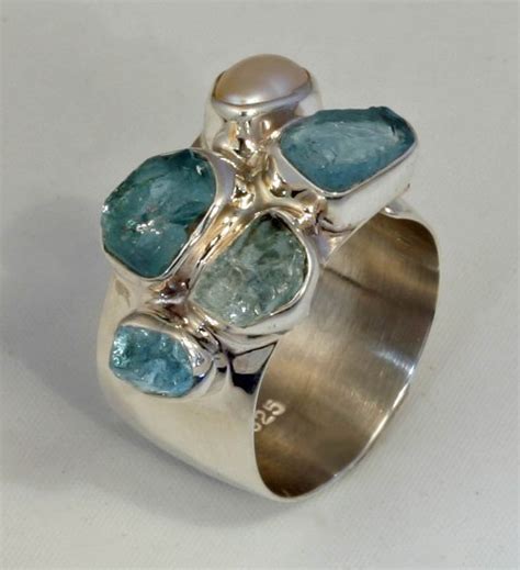 Lilly barrack - Up for sale is this vintage estate eye-catching Lilly Barrack open wrap-around pearl and abalone 925 sterling silver designer ring in size 8.5. This elongated ring is perfect for a middle or index finger. The ring features an oval natural white pearl and an off-white abalone stone set in smooth